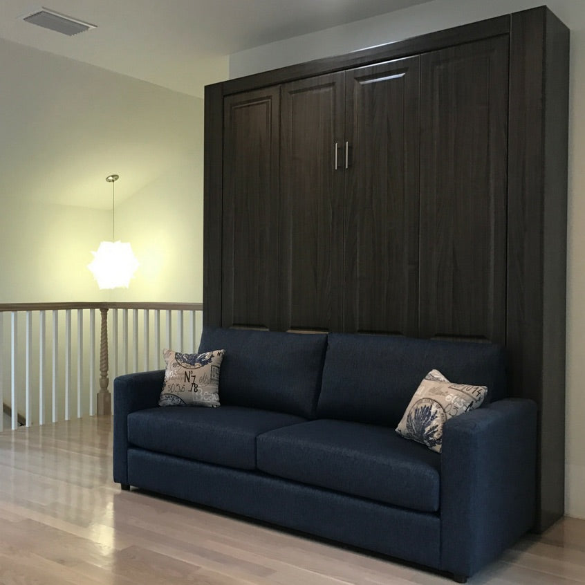 Sofa and Panel Bed Ensemble with color naval sofa, left angled view, bed pulled up