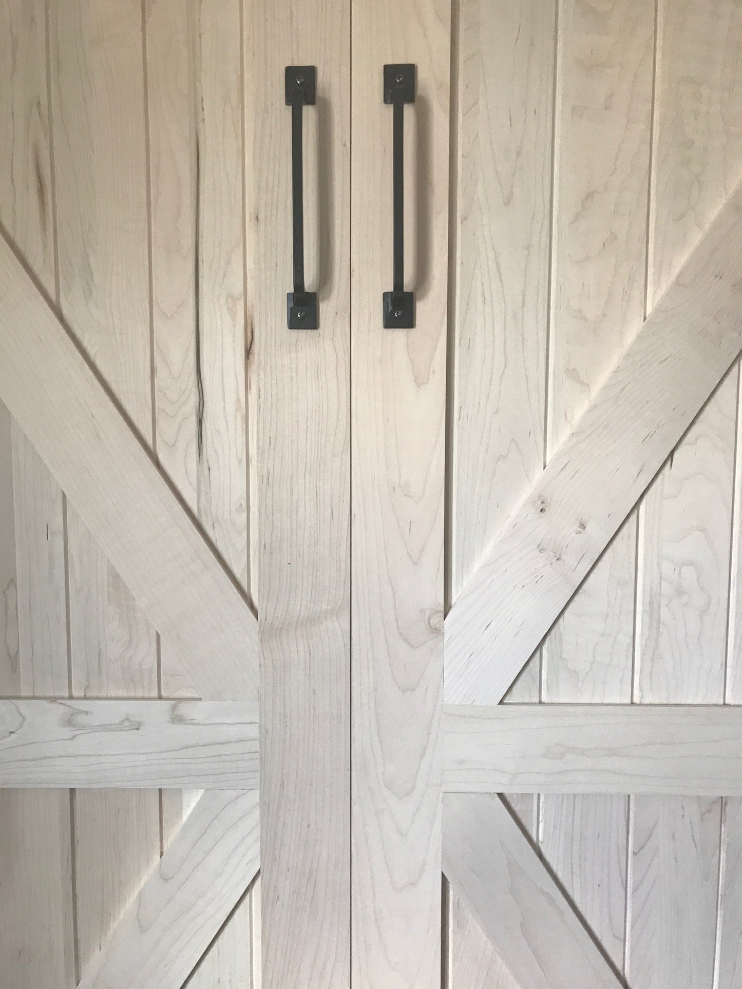 The Barn Door Panel Bed A in color white, front view with handle