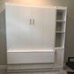The home office Murphy bed with a desk in color white, bed pulled up