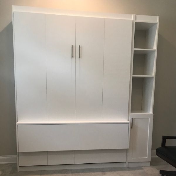 The home office Murphy bed with a desk in color white, bed pulled up